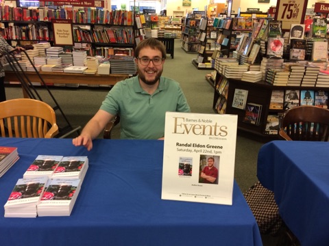 Writer Randal Eldon Greene signing his novel at Barnes & Noble in Sioux City