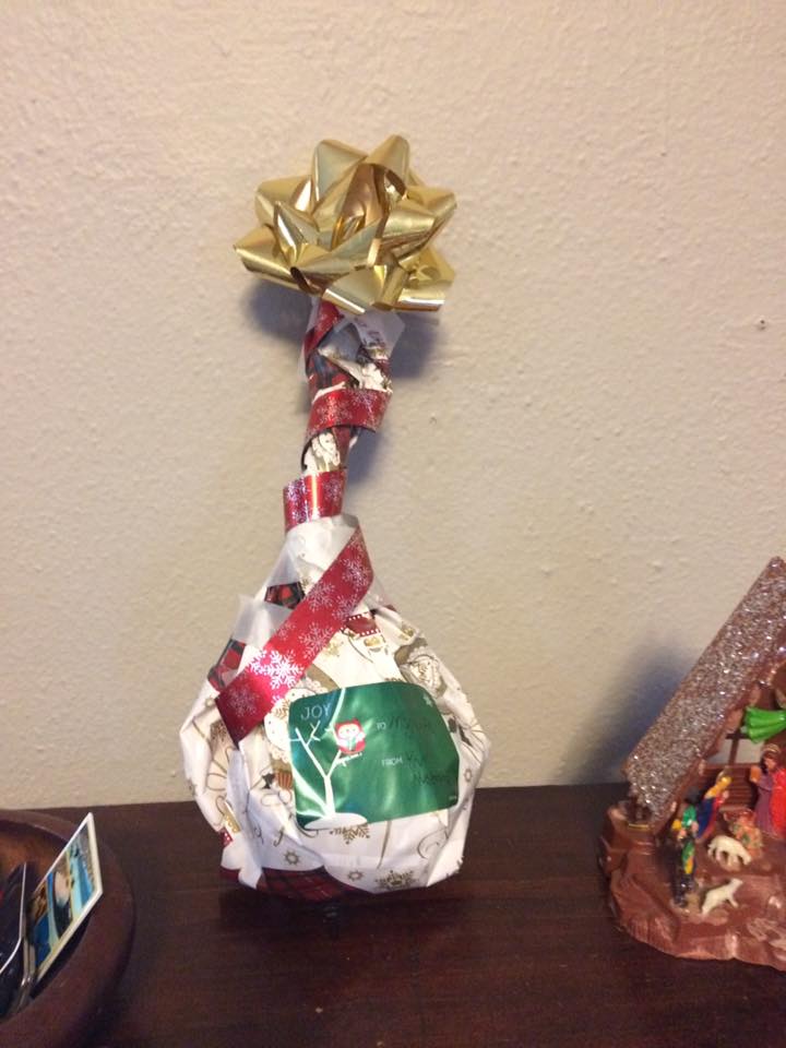 poorly wrapped Christmas gift